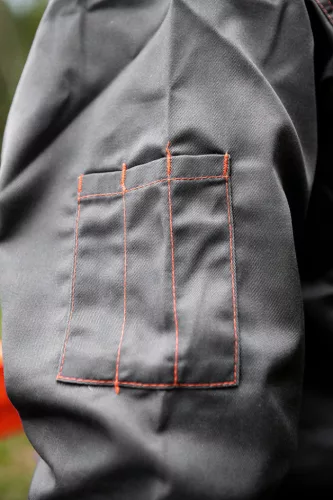 Neo Tools Munkavédelmi kabát, Basic, 35% pamut, 65% polyester, többfunkciós zsebek, gumírozott derék, CE EN341, LD/54